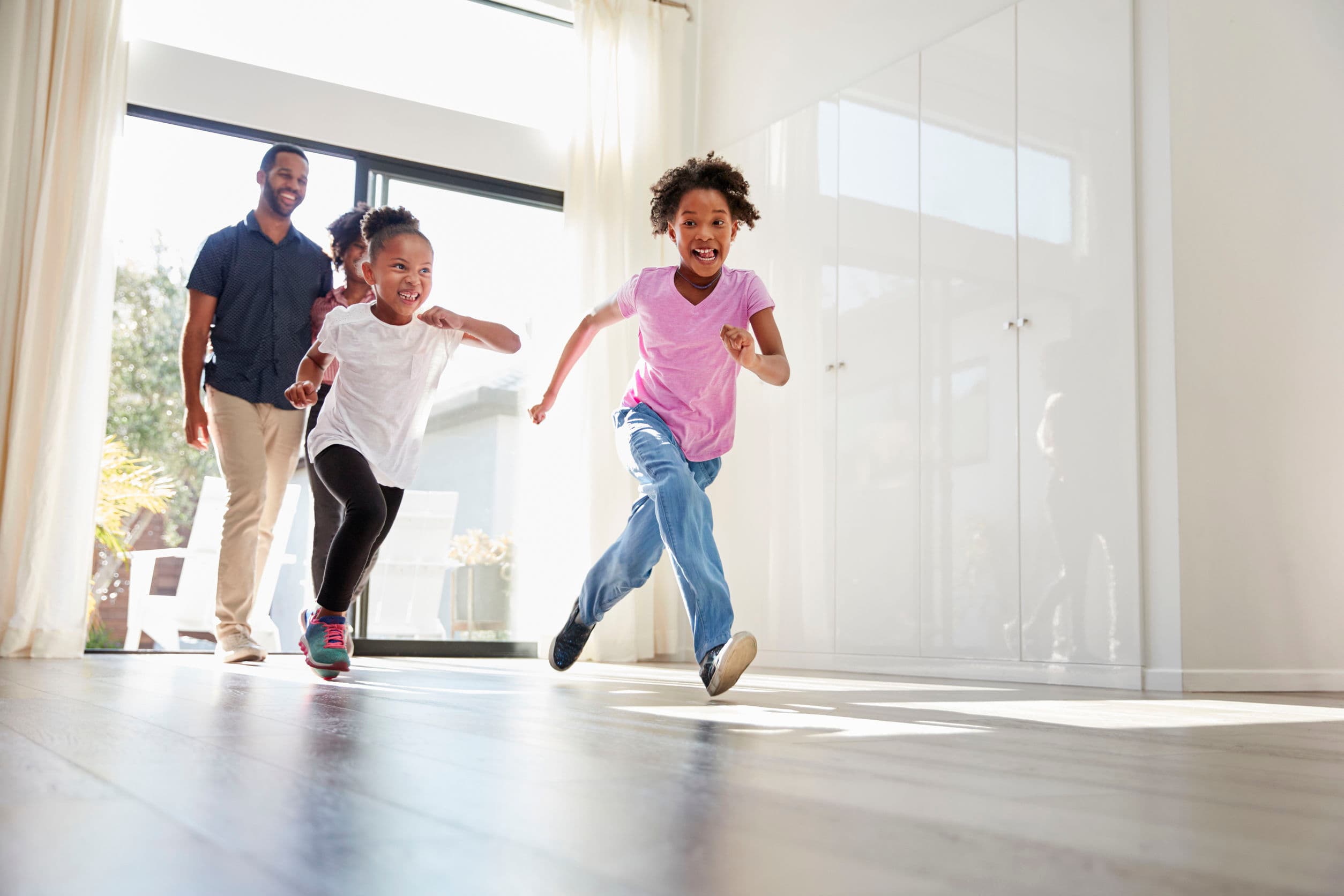 A family moving into their new Lekki Serviced Flats apartment